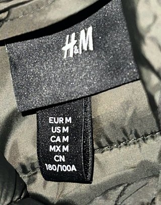 Chaqueta de plumas H&M negra