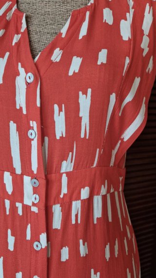 Vestido camisero estampado naranja y blanco