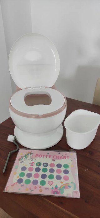 Orinal infantil y tabla de pegatinas