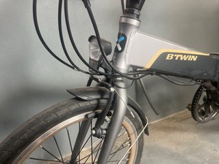 Bicicleta eléctrica plegable Btwin e-hoptown 500