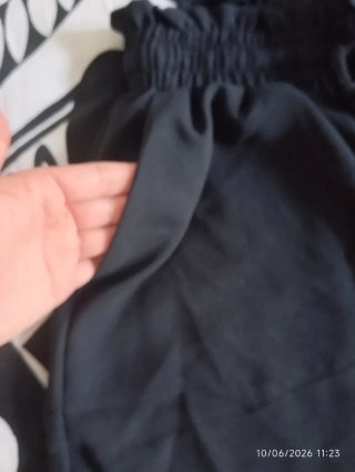 Pantalones anchos plisados
