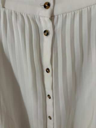Falda midi blanca plisada