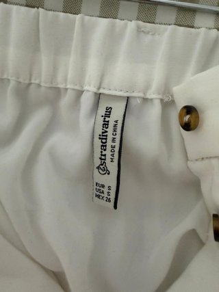 Falda midi blanca plisada