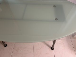 Mesa de comedor redonda de cristal