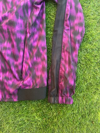 Conjunto deportivo Boomerang morado y negro