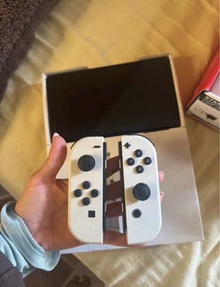 Nintendo Switch OLED Bianca + Giochi