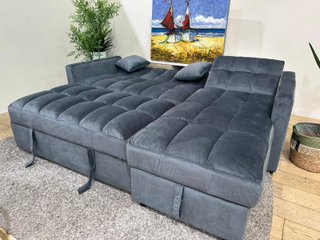 Sofá cama gris de terciopelo