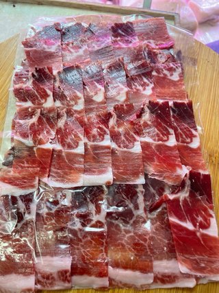 Corte de jamón o paleta  a cuchillo y envasado