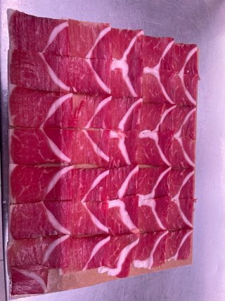 Corte de jamón o paleta  a cuchillo y envasado