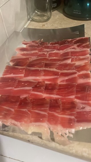 Corte de jamón o paleta  a cuchillo y envasado