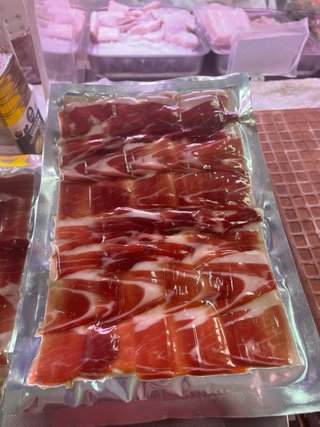 Corte de jamón o paleta  a cuchillo y envasado