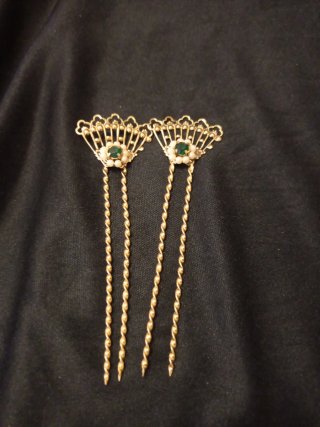 Rascamoños dorados con detalles verdes alicantina