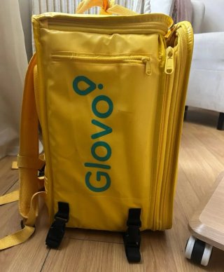 Mochila Glovo Amarilla para reparto. Como nueva