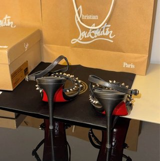 Tacchi Christian Louboutin Neri e Argentati