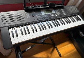 Teclado electrónico con soporte