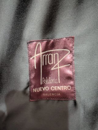 Abrigo de astracán con cuello de zorro