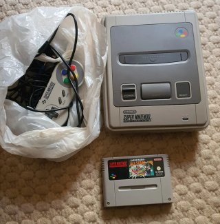 Super Nintendo con Super Mario All Stars