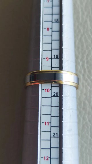 Anillo chapado oro y plata nuevo.