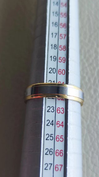 Anillo chapado oro y plata nuevo.