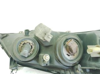 Faro izquierdo opel 20779917 1eg007640 astra g 2.0