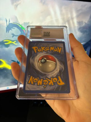 Pikachu W Stamp CGC 7 Jungle 1st Ed.