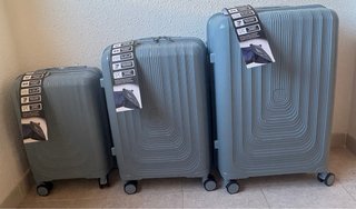 Juego de maletas con ruedas giratorias