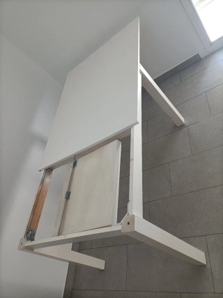 Mesa de comedor extensible blanca de madera