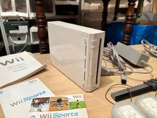 Nintendo Wii + 3 Juegos