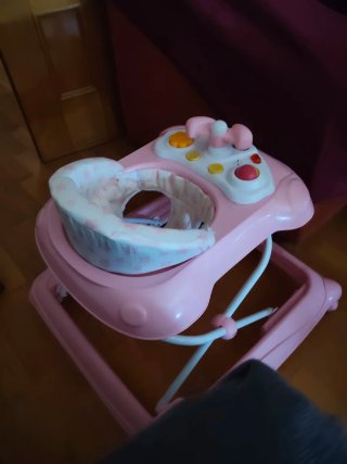 Andador infantil rosa con estrellas