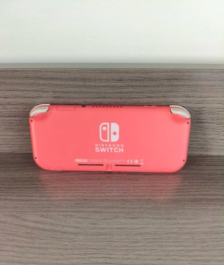 Nintendo Switch Lite Rosa + Caricabatterie e scatola