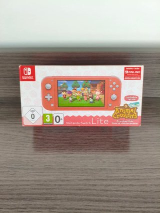 Nintendo Switch Lite Rosa + Caricabatterie e scatola