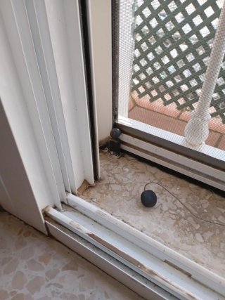Ventana corredera con persiana y mosquitera