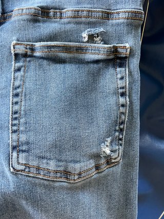Jeans ragazzo strappati