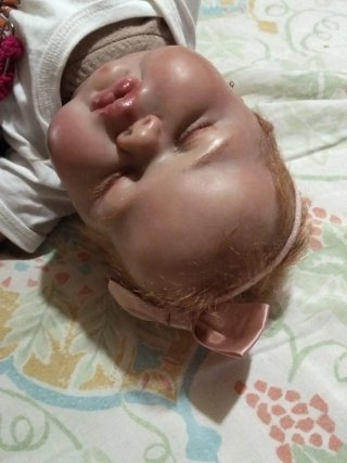 Muñeca Reborn Bebé con Chupete Hello Kitty