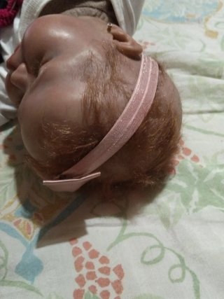 Muñeca Reborn Bebé con Chupete Hello Kitty