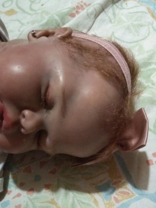 Muñeca Reborn Bebé con Chupete Hello Kitty