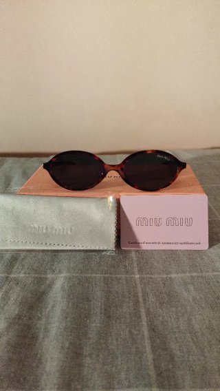 Gafas de sol Miu Miu marrones carey mujer