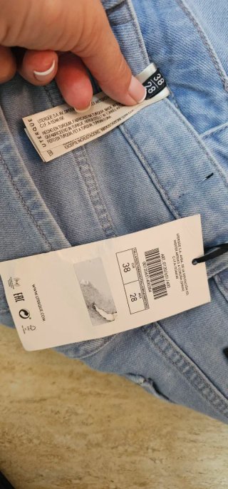 Pantalón Uterqüe azul con tachuelas