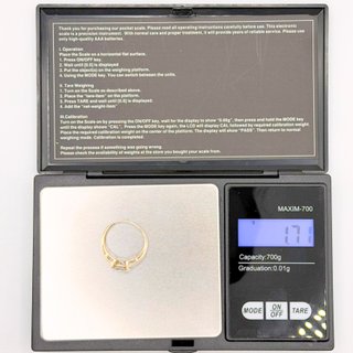 Solitario de oro de 9k circonita, 1.71 g, T-14.