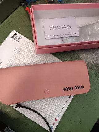 Occhiali da sole Miu Miu oro e neri