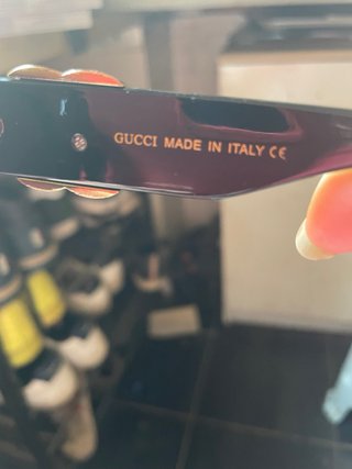 Occhiali da sole Gucci neri e viola