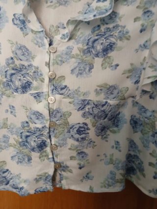 Blusa floral sin mangas