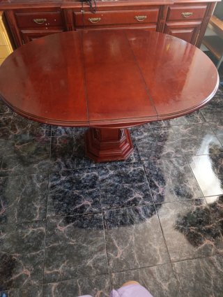 Mesa de comedor redonda de madera