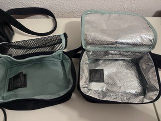 Pañalera negra con accesorios