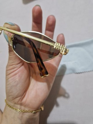 Gafas Miu Miu Marrones y Doradas