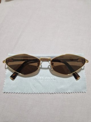 Gafas Miu Miu Marrones y Doradas
