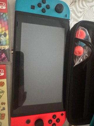 Nintendo Switch + Accessori e Giochi