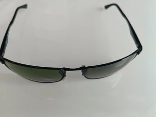 Gafas de sol Ray-Ban negras y verdes