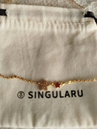 Collar cadena fina con estrellas doradas
