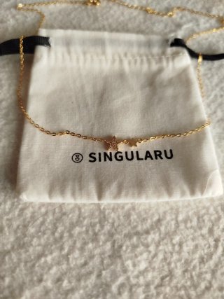 Collar cadena fina con estrellas doradas